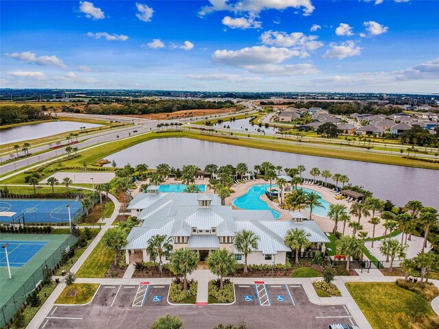 6317 Brevada Ln, Apollo Beach, FL 33572 - drone / aerial view of a nearby body of water and a pool area