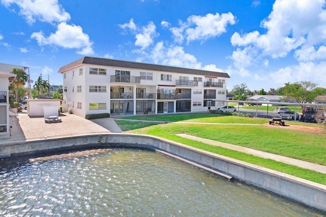 exterior space with a water view