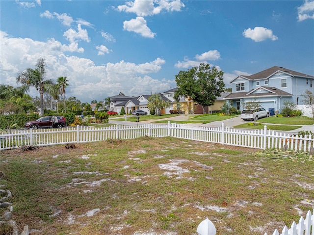 view of yard with a garage