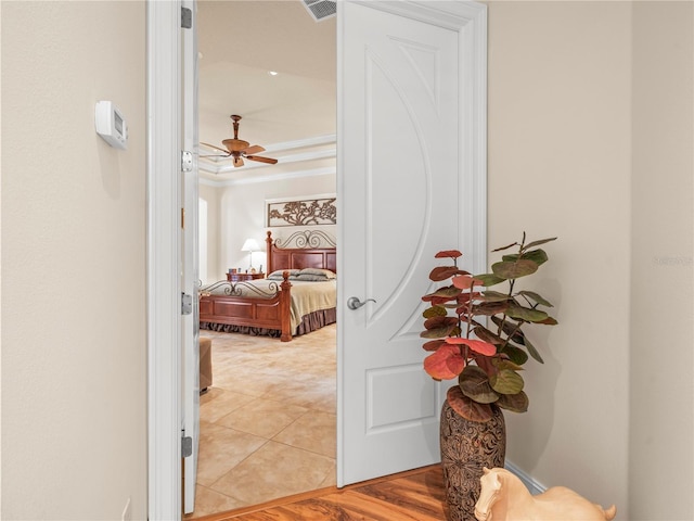 hall with hardwood / wood-style flooring