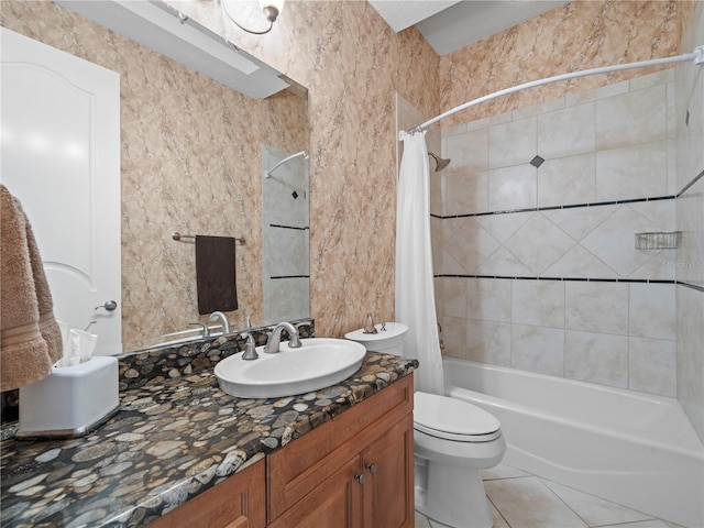 full bathroom with toilet, vanity, shower / bath combo with shower curtain, and tile patterned flooring