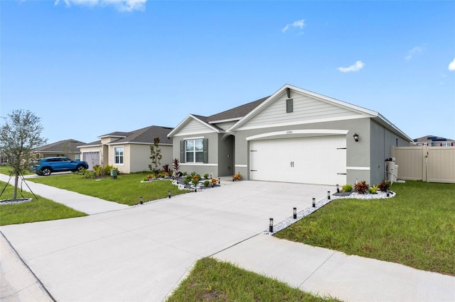 single story home with a garage and a front yard