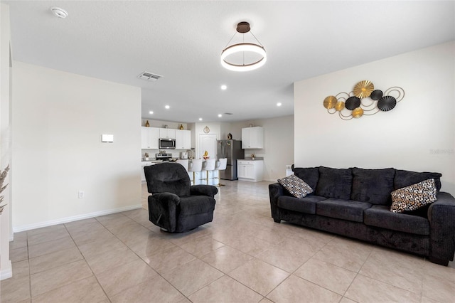 living room featuring light tile patterned floors