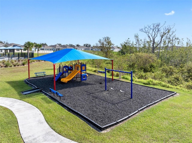 view of play area featuring a lawn