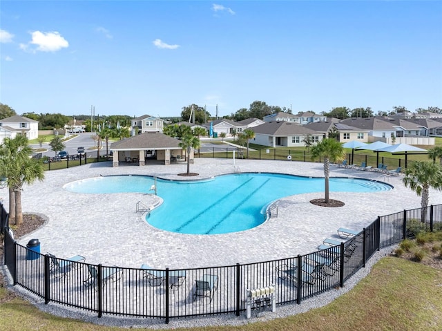 view of swimming pool with a patio area