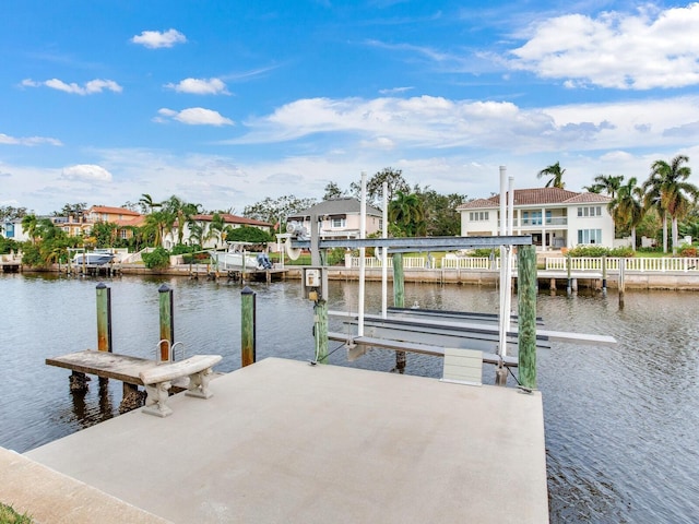 dock area with a water view