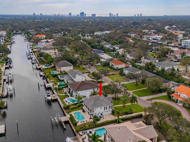 birds eye view of property featuring a water view