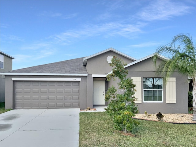 ranch-style house with a front lawn and a garage