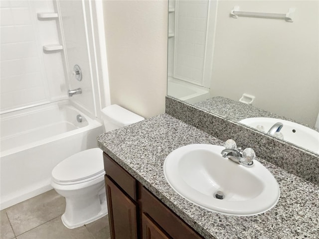 full bathroom featuring vanity, tile patterned floors, toilet, and shower / washtub combination