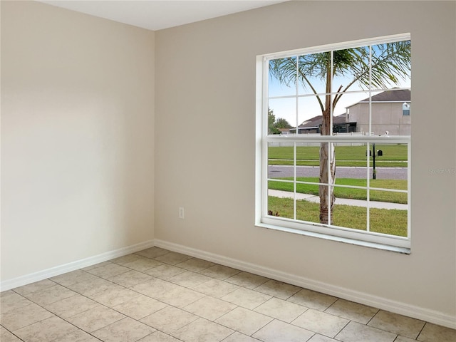 view of tiled spare room