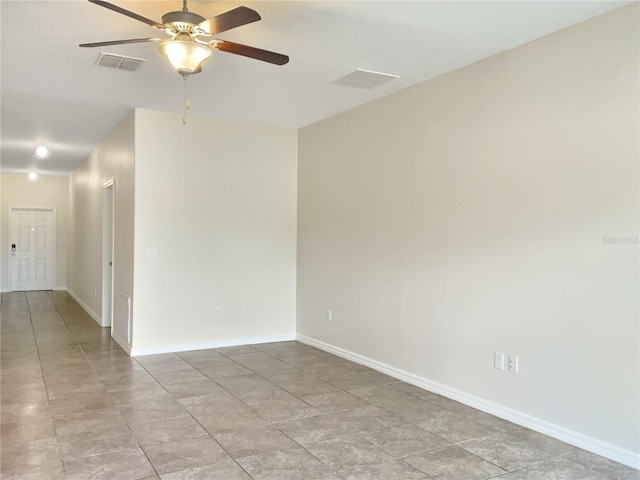 unfurnished room with ceiling fan