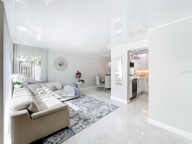 living room featuring a high ceiling