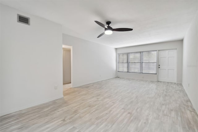 4152 55th Way N Unit 1028, Kenneth City, FL 33709 - empty room with ceiling fan, light wood-style floors, and baseboards