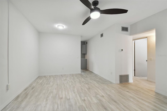 spare room with ceiling fan and light hardwood / wood-style floors