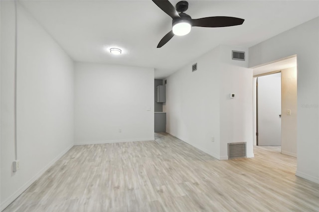 4152 55th Way N Unit 1028, Kenneth City, FL 33709 - empty room with a ceiling fan, light wood finished floors, and baseboards