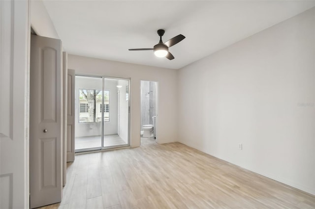 empty room featuring light hardwood / wood-style floors and ceiling fan