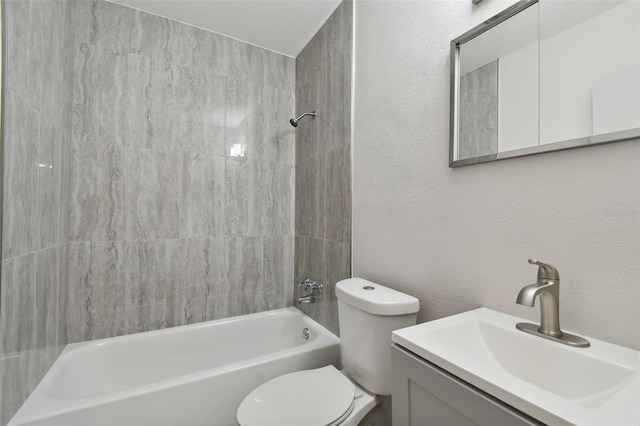 4152 55th Way N Unit 1028, Kenneth City, FL 33709 - full bath with toilet, bathtub / shower combination, vanity, and a textured wall