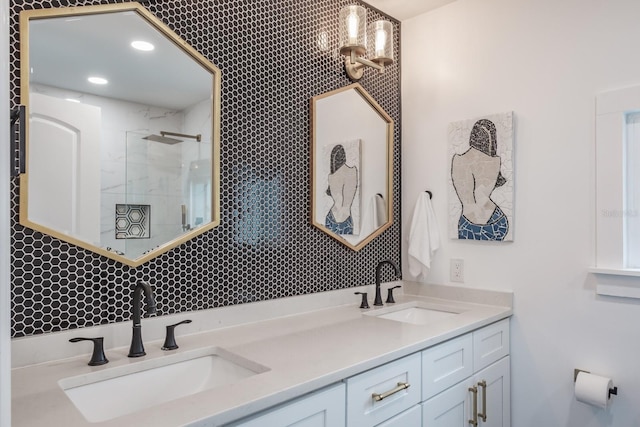 bathroom featuring vanity and a tile shower