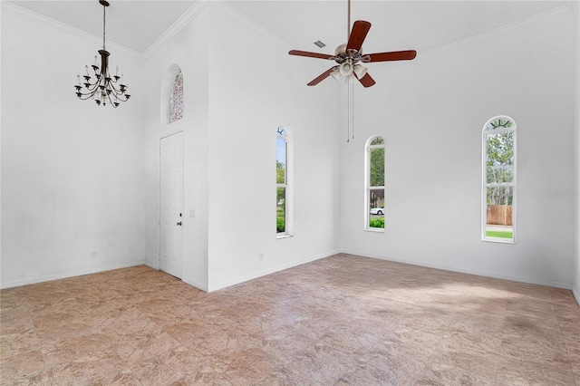 unfurnished room featuring ceiling fan with notable chandelier, ornamental molding, and a high ceiling