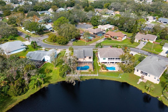 drone / aerial view with a water view