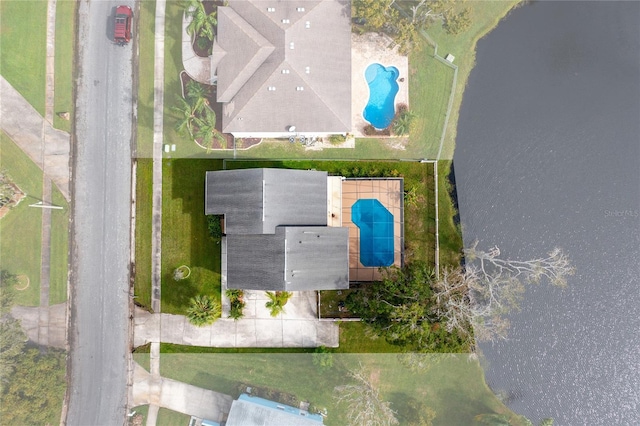 drone / aerial view featuring a water view