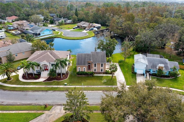 birds eye view of property featuring a water view