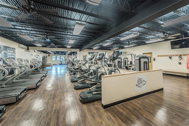 workout area with wood-type flooring