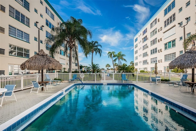 view of swimming pool with a patio area