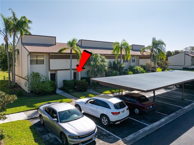 9209 Seminole Blvd Unit 75, Seminole, FL 33772 - view of partially covered parking lot