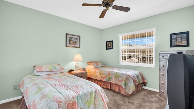 bedroom with carpet and ceiling fan