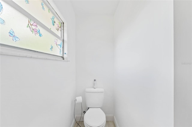 bathroom featuring toilet