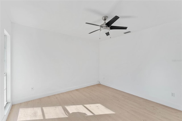 unfurnished room with light hardwood / wood-style floors and ceiling fan