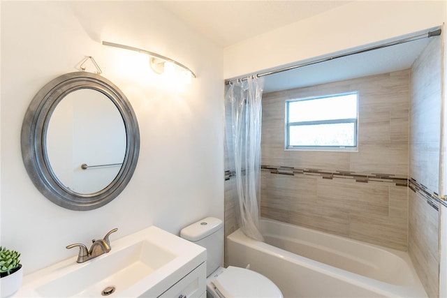 full bathroom featuring vanity, toilet, and shower / tub combo