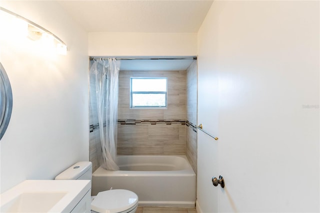 full bathroom with vanity, toilet, and shower / tub combo