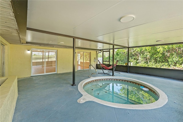 view of pool with an indoor in ground hot tub