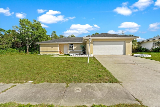 single story home featuring a garage and a front lawn