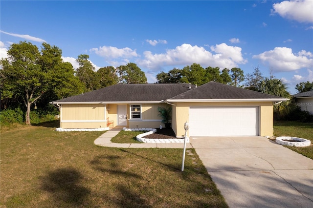 ranch-style house featuring a garage and a front lawn