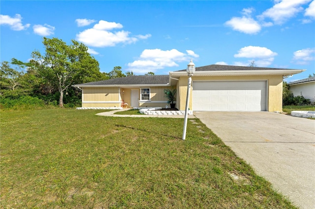 view of front of home featuring a garage and a front yard