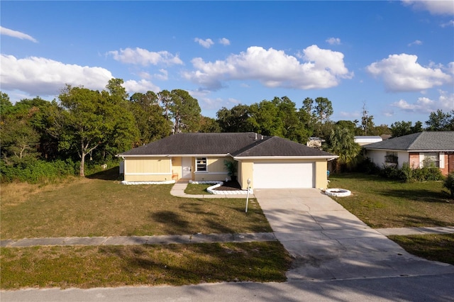 ranch-style home featuring a front lawn and a garage