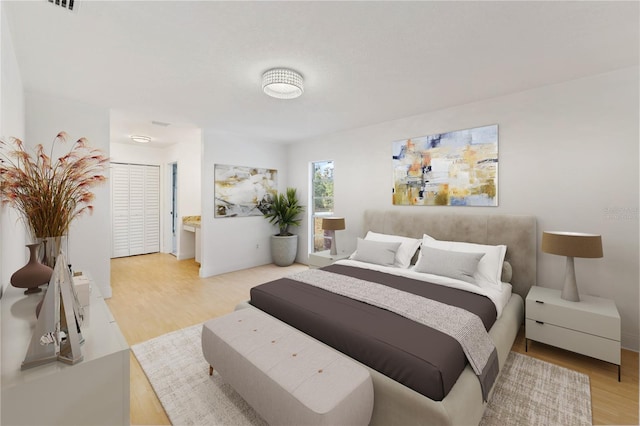 bedroom featuring light hardwood / wood-style flooring