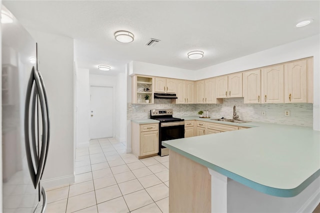 kitchen featuring kitchen peninsula, sink, light tile patterned flooring, and stainless steel appliances