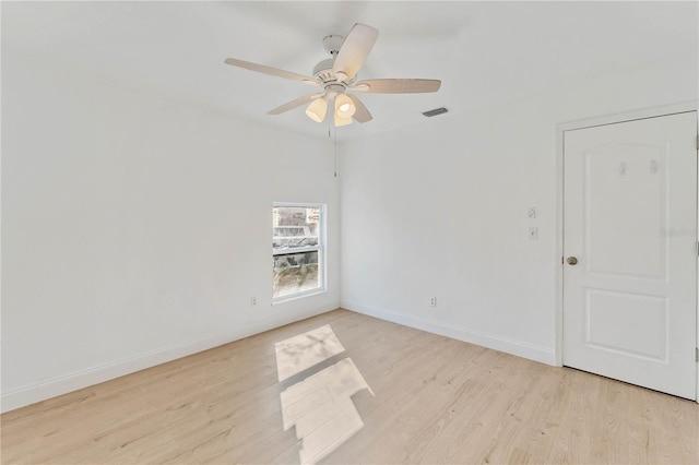 unfurnished room featuring ceiling fan and light hardwood / wood-style floors