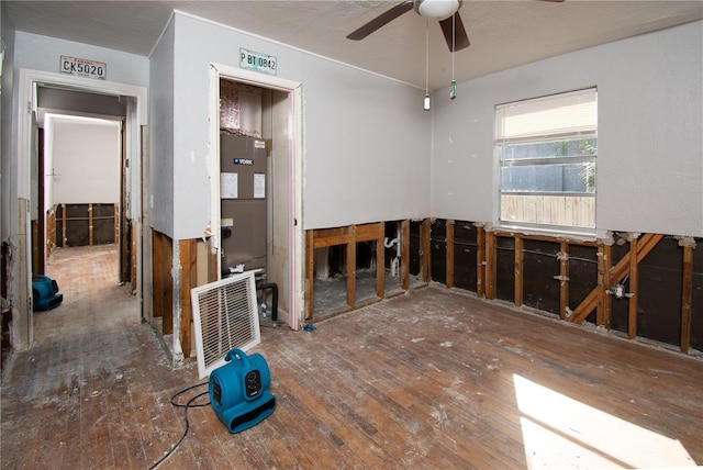 empty room with hardwood / wood-style flooring and ceiling fan