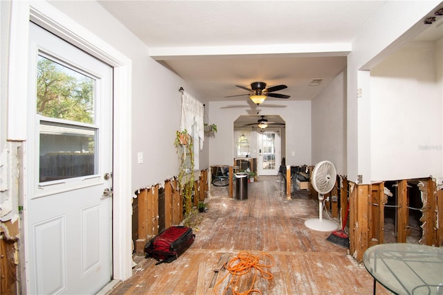 interior space featuring hardwood / wood-style floors, a wealth of natural light, and ceiling fan