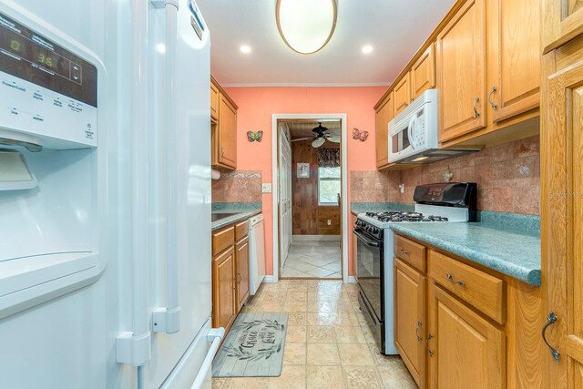 kitchen featuring light tile patterned flooring, ornamental molding, decorative backsplash, white appliances, and ceiling fan