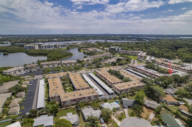 drone / aerial view with a water view