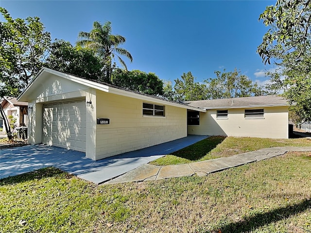 5301 82nd Ave N, Pinellas Park, FL 33781 - view of front of property featuring a front yard and concrete block siding