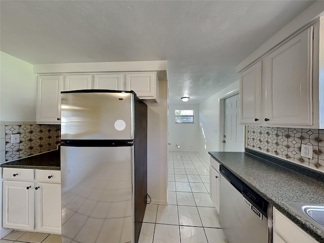 kitchen featuring white cabinetry and stainless steel appliances