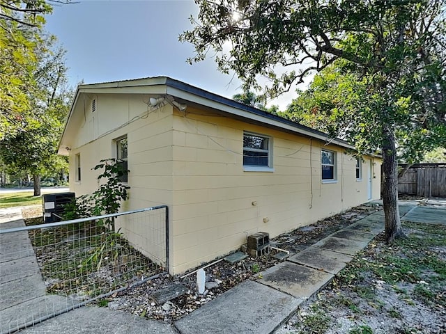 view of property exterior featuring a patio area