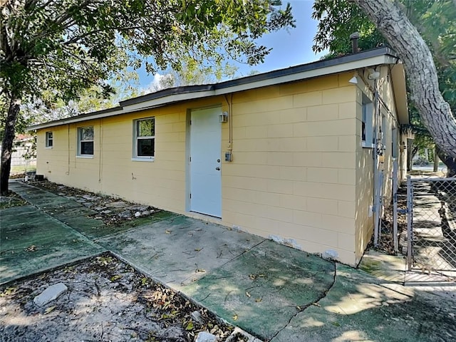 back of property featuring a patio